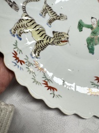 A Chinese famille verte Kakiemon-style 'Boy and Tigers' lobed dish, Kangxi