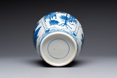 A Chinese blue and white 'Antiquities and Flower Baskets' vase with a wooden cover, Kangxi
