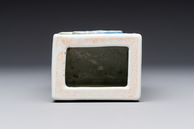 A Chinese famille rose relief-moulded rectangular brush pot with figural design, Yongzheng