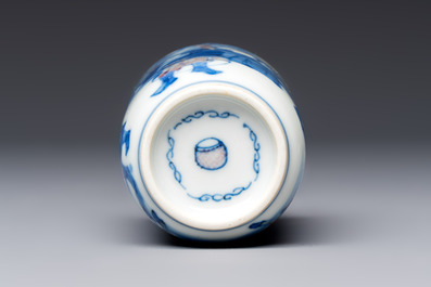 A Chinese blue, white and copper-red snuff bottle with narrative design, 19th C.