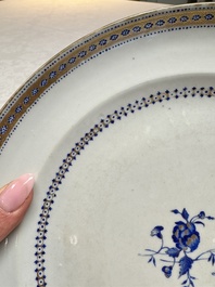 Two Chinese export famille rose plates and three gilt blue-enamelled plates, Qianlong/Jiajing