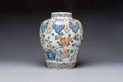 A large Dutch Delft cashmere palette vase with a phoenix and birds among flowers, ca. 1700