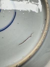 A pair of Chinese blue and white plates with narrative design, Yongzheng
