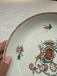 Two Chinese export famille rose plates and three gilt blue-enamelled plates, Qianlong/Jiajing