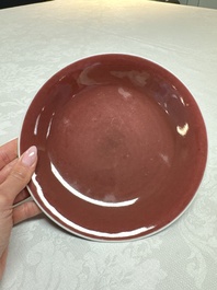 A pair of Chinese copper-red-glazed plates, Qianlong mark and of the period