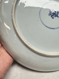 A pair of Chinese blue and white plates with narrative design, Yongzheng