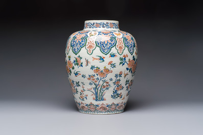 A large Dutch Delft cashmere palette vase with a phoenix and birds among flowers, ca. 1700