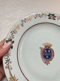 Two Chinese export famille rose plates and three gilt blue-enamelled plates, Qianlong/Jiajing