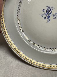 Two Chinese export famille rose plates and three gilt blue-enamelled plates, Qianlong/Jiajing