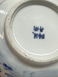 A pair of Chinese blue and white 'Bleu de Hue' covered bowls with landscape design, Phong Vu Quy Chu 風雨歸舟 marks, 19th C.