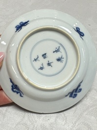 12 Chinese blue and white saucers with figural design, lingzhi and Chenghua marks, Kangxi