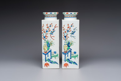A pair of Chinese famille verte 'Antiquities' square vases, 19th C.
