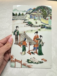 A Chinese famille verte 'Rice and Silk Production' plaque, 19th C.