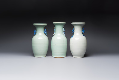 Two Chinese blue and white celadon-ground vases and a blue and white vase, on wooden stands, 19th C.