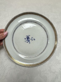 Two Chinese export famille rose plates and three gilt blue-enamelled plates, Qianlong/Jiajing
