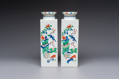 A pair of Chinese famille verte 'Antiquities' square vases, 19th C.