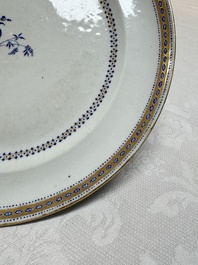 Two Chinese export famille rose plates and three gilt blue-enamelled plates, Qianlong/Jiajing