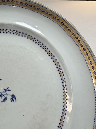 Two Chinese export famille rose plates and three gilt blue-enamelled plates, Qianlong/Jiajing