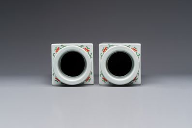 A pair of Chinese famille verte 'Antiquities' square vases, 19th C.