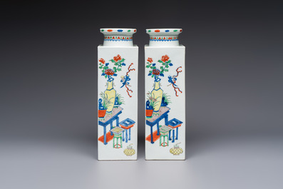 A pair of Chinese famille verte 'Antiquities' square vases, 19th C.