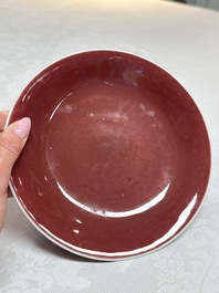 A pair of Chinese copper-red-glazed plates, Qianlong mark and of the period