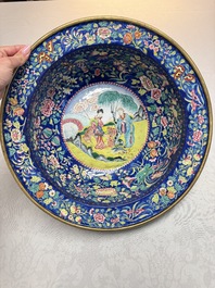 A large Chinese Canton enamel basin and jug with narrative design, early 19th C.