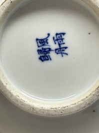 A pair of Chinese blue and white 'Bleu de Hue' covered bowls with landscape design, Phong Vu Quy Chu 風雨歸舟 marks, 19th C.