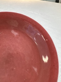 A pair of Chinese copper-red-glazed plates, Qianlong mark and of the period