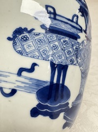 A Chinese blue and white ovoid 'Antiquities' jar with a wooden cover, Kangxi