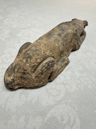 A Chinese grey pottery model of a reclining dog, Han