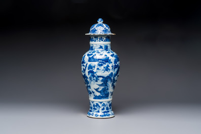 A Chinese blue and white covered vase with figures in landscapes, Kangxi