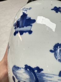 A Chinese blue and white ovoid 'Antiquities' jar with a wooden cover, Kangxi