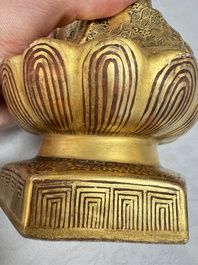 A Japanese Satsuma figure of Buddha seated on a lotus base, Hododa 保土田 mark, Meiji, 19/20th C.