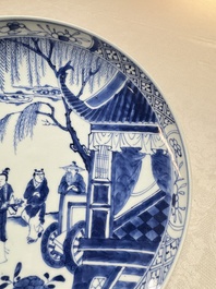 A pair of Chinese blue and white plates with narrative design, Yongzheng