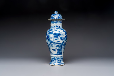 A Chinese blue and white covered vase with figures in landscapes, Kangxi