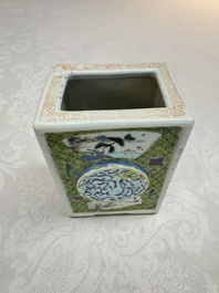 A Chinese famille rose relief-moulded rectangular brush pot with figural design, Yongzheng
