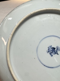 A pair of Chinese blue and white plates with narrative design, Yongzheng