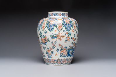 A large Dutch Delft cashmere palette vase with a phoenix and birds among flowers, ca. 1700