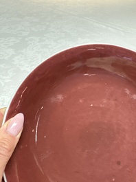 A pair of Chinese copper-red-glazed plates, Qianlong mark and of the period