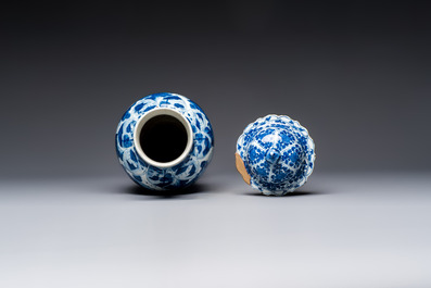A Chinese blue and white covered vase with figures in landscapes, Kangxi