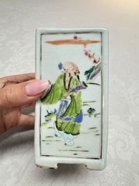 A Chinese famille rose relief-moulded rectangular brush pot with figural design, Yongzheng