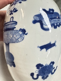 A Chinese blue and white ovoid 'Antiquities' jar with a wooden cover, Kangxi