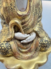 A Japanese Satsuma figure of Buddha seated on a lotus base, Hododa 保土田 mark, Meiji, 19/20th C.