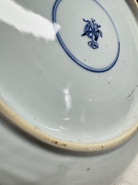 A pair of Chinese blue and white plates with narrative design, Yongzheng