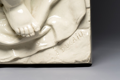 Joseph Ducaju (Antwerp, 1823-1891): a white glazed 'Under God's Protection' group, signed, 19th C.