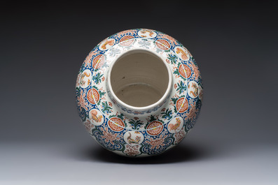 A large Dutch Delft cashmere palette vase with a phoenix and birds among flowers, ca. 1700