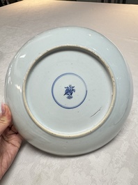A pair of Chinese blue and white plates with narrative design, Yongzheng