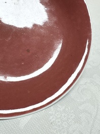 A pair of Chinese copper-red-glazed plates, Qianlong mark and of the period