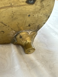 A large Chinese bronze 'Dragon' tripod censer, 19th C.