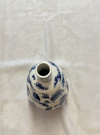 A pair of Chinese blue and white 'Buddhist Lions' triple gourd vases on reticulated wooden stands, 19th C.